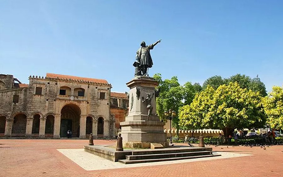 The Columbus statue in the park, in front of the cathedral