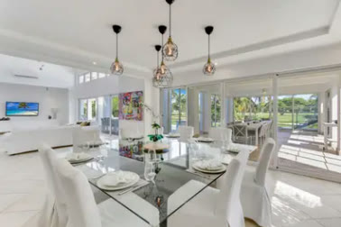The indoor dining room with pendant lights