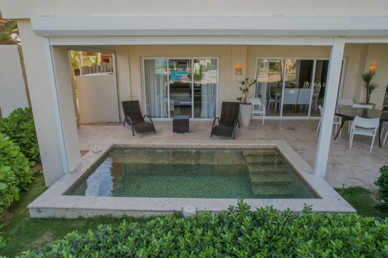 The private plunge pool with sun loungers on the terrace