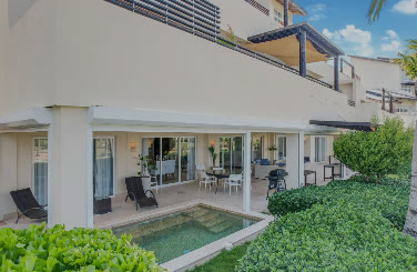 The condo façade with its terrace and private pool