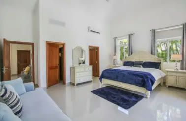 The main bedroom with a blue rug