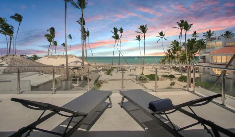 Sunset from the terrace, over the beach palms
